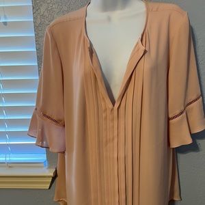 Beautiful peach Ann Taylor blouse in excellent used condition.